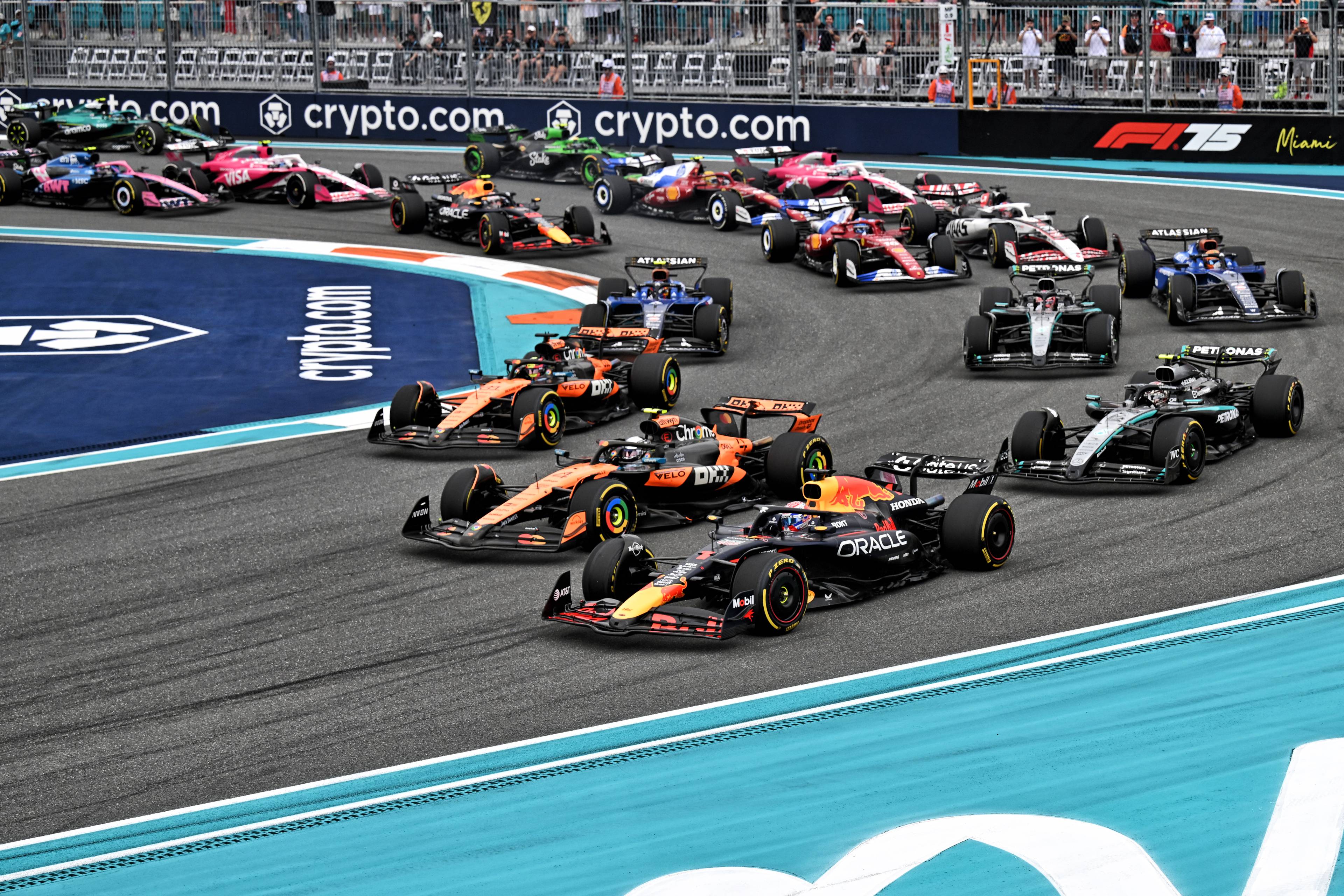 Verstappen defending against Piastri and Norris